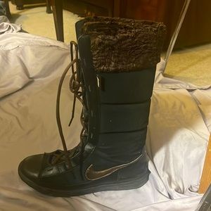 Nike high top lace up winter sneakers.
